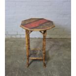 Japanese Bamboo Occasional Table (circa late 19th century) Having an Octagonal top above under tier,