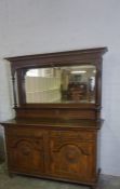 Oak Mirror Back Sideboard (circa early 20th century) Having a mirrored section above two small