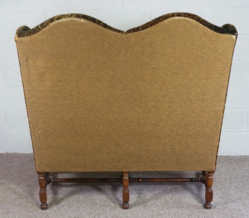 Walnut Framed Wing Back Settee, In Jacobean style, set with tapestry panels, on scroll legs and - Image 6 of 7
