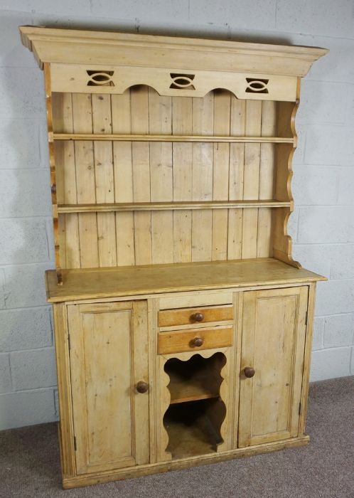 Pine Dresser, Late 19th Century, Having open shelving above drawers and cupboard doors, 189cm