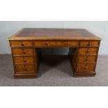 A Victorian Mahogany Partners Desk, Rectangular top over three shallow frieze drawers above an