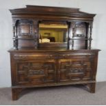 A Victorian Oak Mirror Back Side Board, With dentil cornice over a rectangular plate and an