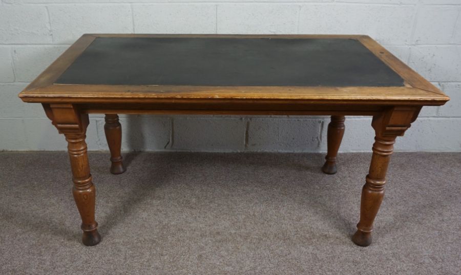 Oak and Pine Center Table, Rectangular top with leather inset panel raised on turned tapered legs