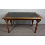 Oak and Pine Center Table, Rectangular top with leather inset panel raised on turned tapered legs