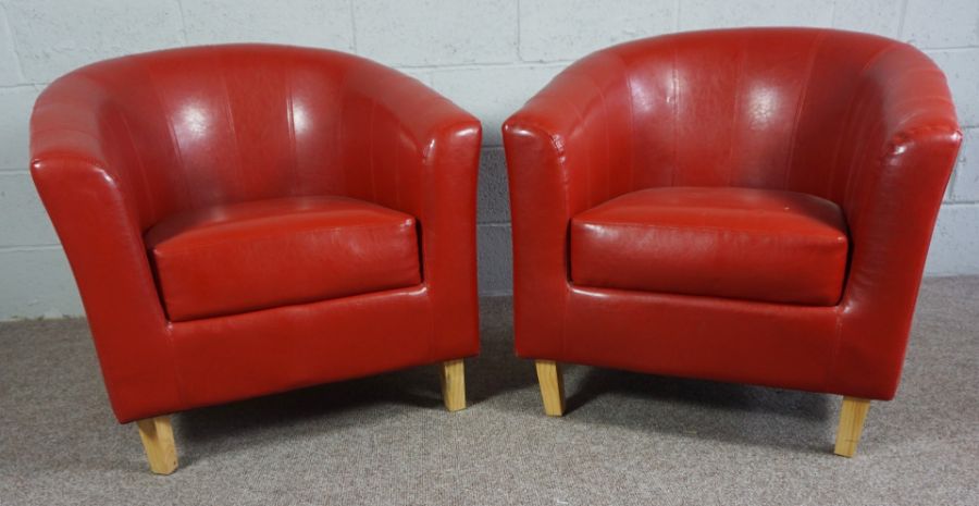 Two Orange Faux Leather Tub Chairs