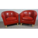 Two Orange Faux Leather Tub Chairs