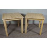 A pair of modern pine square topped occasional tables
