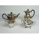 A Late Victorian Silver Plate Four Piece Tea Service, Of semi ovoid form with gadrooned borders on