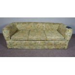 Floral 3 seater Chesterfield sofa with denim patchwork to the right arm.