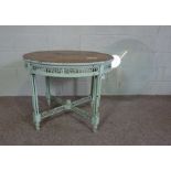 A painted Edwardian style Colonial style occasional table, with later glass top, the circular top