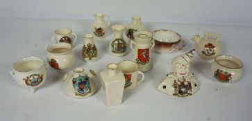 A collection of assorted crested china, including Arcadian ware figure of a clown, and other similar