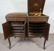 A Victrola Electrola record player and music cabinet, early 20th century, number VE220, together