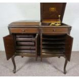 A Victrola Electrola record player and music cabinet, early 20th century, number VE220, together