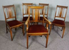 A set of five oak framed dining chairs, mid 20th century, including an armchair (5)