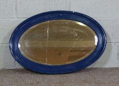 Three assorted modern wall mirrors, including a painted oval mirror, and a silvered rectangular