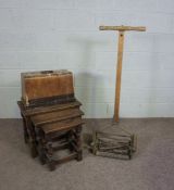 A nest of oak occasional tables, 55cm wide, together with a kitchen chair, Jones sewing machine
