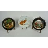 A collection of approximately 59 boxed collector's plates, including Wedgewood, W S George "Horses