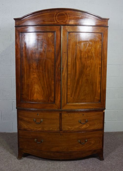 A George IV mahogany bowfront linen press, first half 19th century, with an arched cornice over - Image 4 of 7