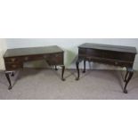 A George III style reproduction desk, 20th century, with rectangular top over an arrangement of five