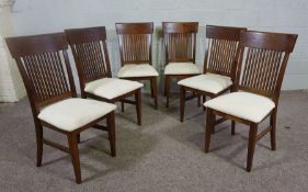 A set of six modern dining chairs,  with slatted backs and drop in seats