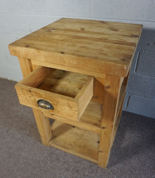 A provincial pine butchers block, 20th century, the thickly planked square top over a single knife - Image 3 of 4