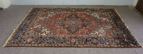 A 20th century wool Kazak style rug, (some wear and holed) 262 x 174cm