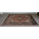 A 20th century wool Kazak style rug, (some wear and holed) 262 x 174cm