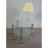 A modern glass three tier Etagere together with a modern table lamp (2)