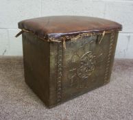 A brass sided coal box with hinged and upholstered top, 33cm high