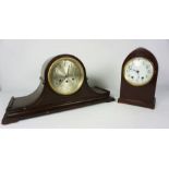 Two American mahogany cased mantel clocks, one with an arched topped case, 20cm high, the other with