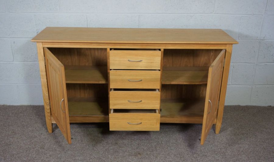 A modern ash low dresser, with four drawers flanked by cabinets, 81cm high, 151cm wide - Image 2 of 4