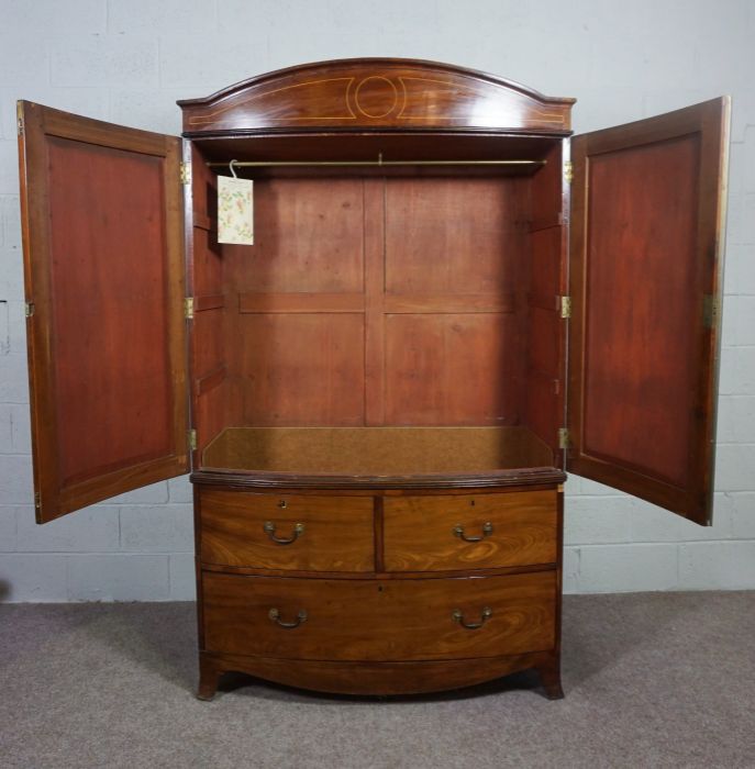 A George IV mahogany bowfront linen press, first half 19th century, with an arched cornice over - Image 5 of 7