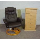 A modern recliner chair, with black 'leather' together with an oak five drawer filing chest (2)