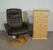 A modern recliner chair, with black 'leather' together with an oak five drawer filing chest (2)