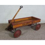 A rare vintage ‘Snappy Boy’ child’s handcart, circa 1930, with a painted wooden open floor, hinged