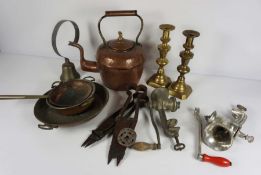 A copper kettle, shop bell, three small copper pans and two meat mincers, with two 19th century