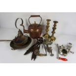 A copper kettle, shop bell, three small copper pans and two meat mincers, with two 19th century