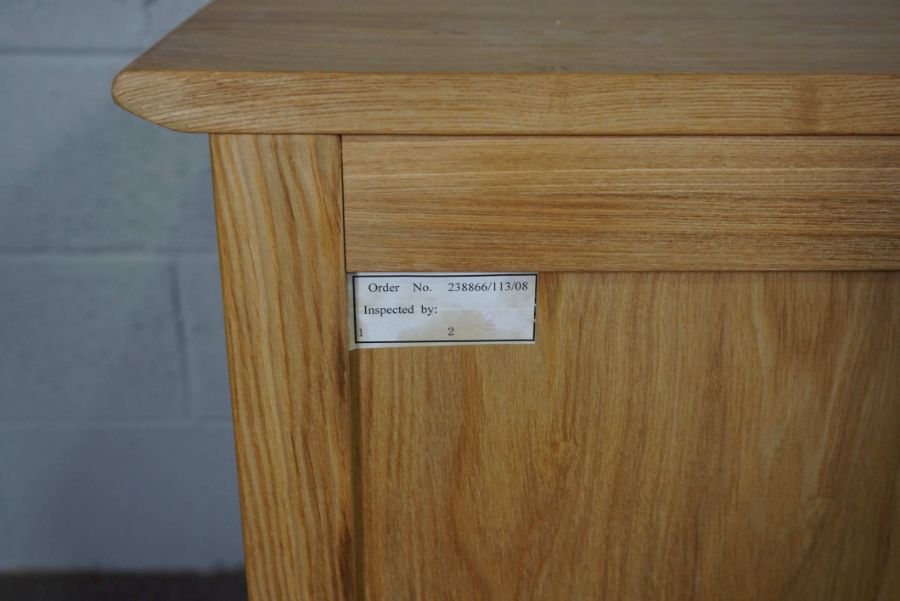 A modern ash low dresser, with four drawers flanked by cabinets, 81cm high, 151cm wide - Image 4 of 4