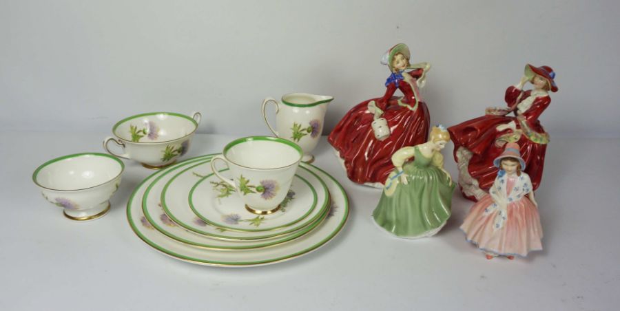 A Royal Doulton ‘Glamis Thistle’ part dinner service, approximately 64 pieces, each decorated with