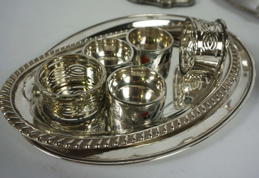 An assortment of silver plate, including a pair of Georgian style three light candelabra, a hot - Image 2 of 3