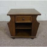 A small bookstand / coffee table, modern, 20th century, with square top over a single drawer, shaped