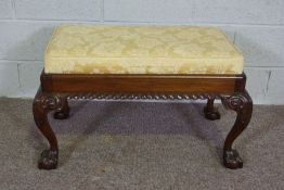 A George III style mahogany duet stool, the inset cushioned top with gadrooned frieze set on four