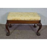 A George III style mahogany duet stool, the inset cushioned top with gadrooned frieze set on four