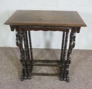A nest of three occasional tables, with turned and scrolled supports, tallest 79cm high (3)