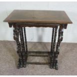 A nest of three occasional tables, with turned and scrolled supports, tallest 79cm high (3)