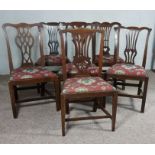 A harlequin set of eight mahogany dining chairs, in George III style, with pierced and shaped splats