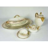 A Martin Limoges part dinner service, 20th century, decorated with a rose border, approx. 68 pieces,