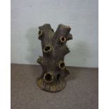 A large Victorian salt glaze stoneware strawberry planter, in the form of a naturalistic tree stump,