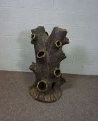 A large Victorian salt glaze stoneware strawberry planter, in the form of a naturalistic tree stump,