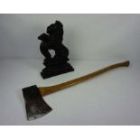 A cast iron doorstop in form of lion rampant, 39cm high; together with an Elwell 4.5 felling axe (